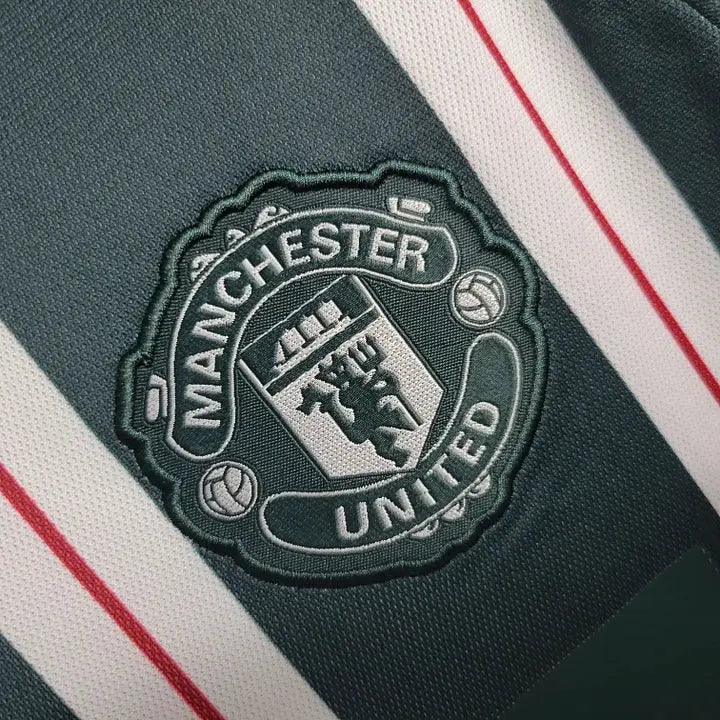 MAILLOT MANCHESTER UNITED EXTERIEUR 2023/2024 - Maillot du Monde