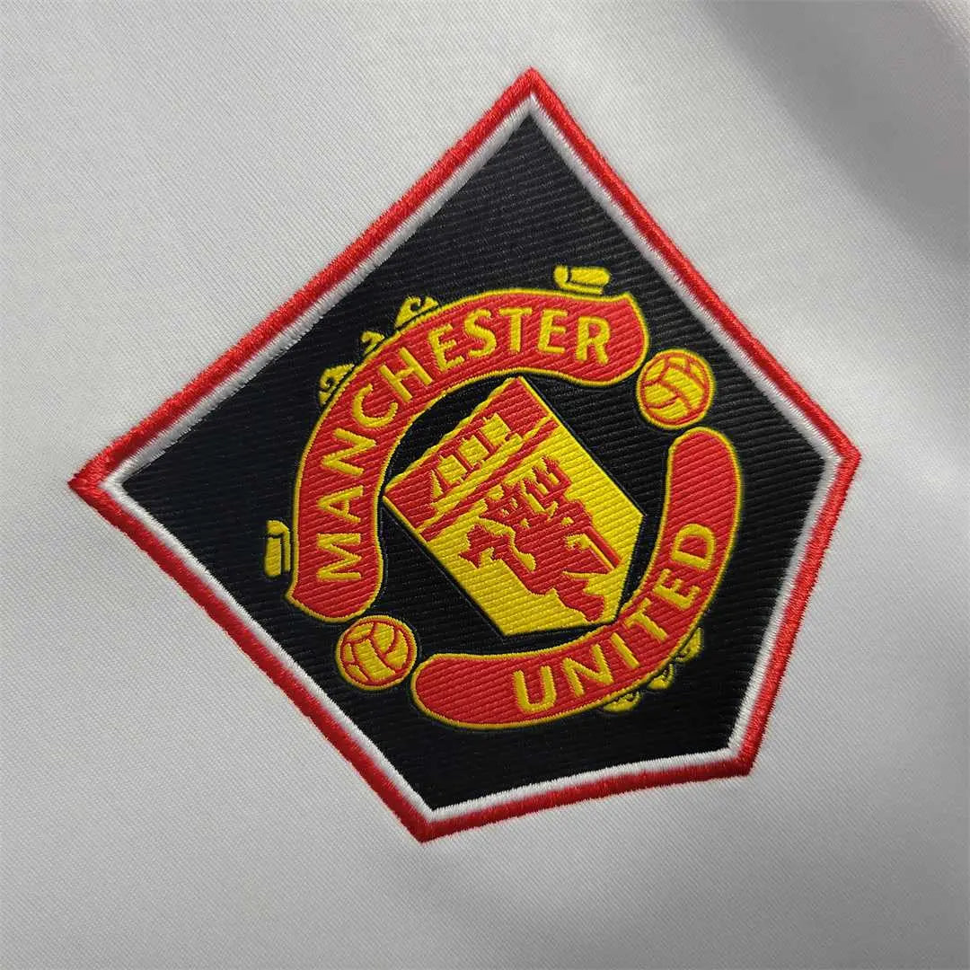 MAILLOT MANCHESTER UNITED EXTÉRIEUR 2022/2023 VERSION MANCHES LONGUES - Maillot du Monde