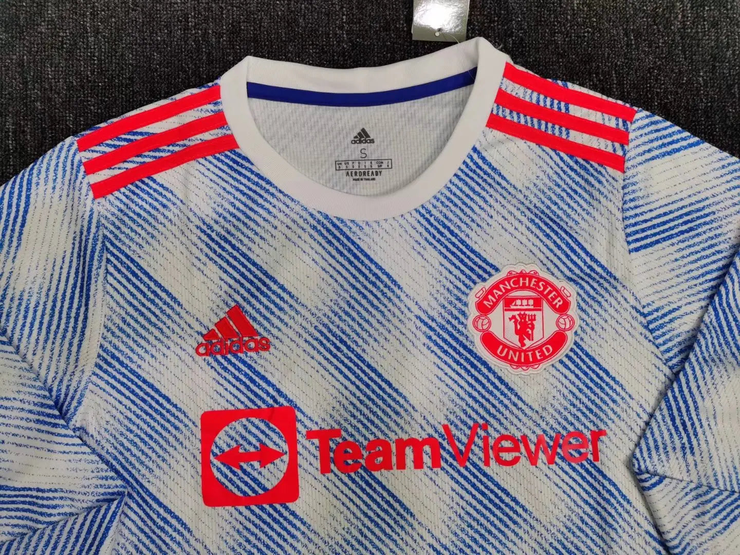 MAILLOT MANCHESTER UNITED EXTÉRIEUR 2021/2022 VERSION MANCHES LONGUES - Maillot du Monde