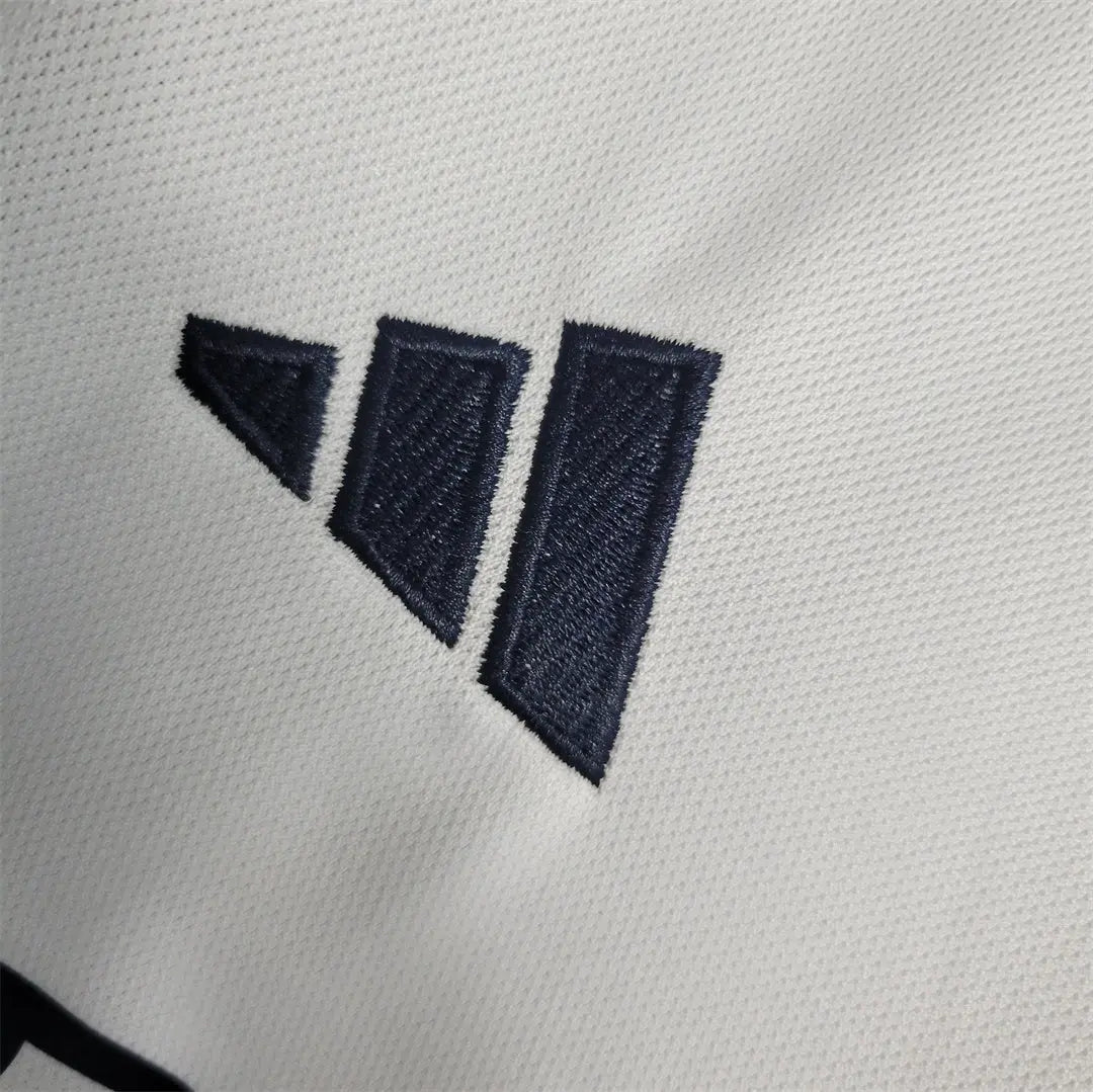 MAILLOT REAL MADRID DOMICILE 2023/2024 VERSION MANCHES LONGUES - Maillot du Monde