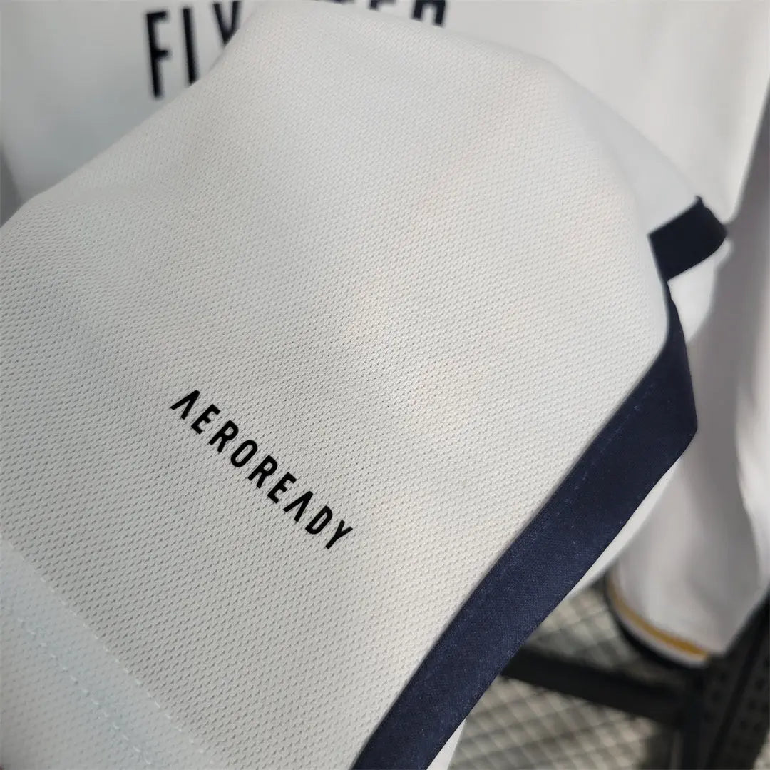MAILLOT REAL MADRID DOMICILE 2023/2024 VERSION MANCHES LONGUES - Maillot du Monde
