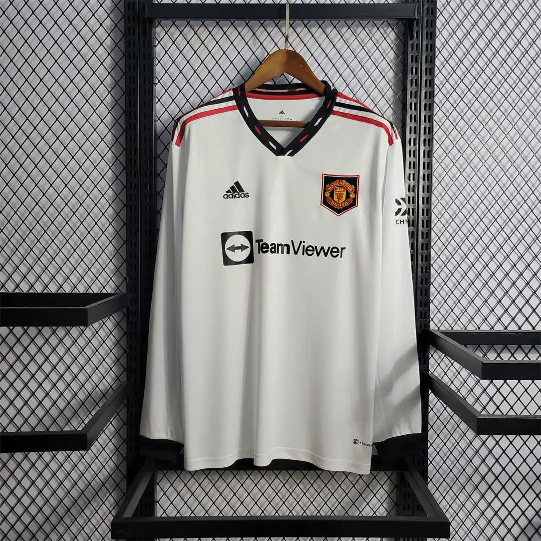 MAILLOT MANCHESTER UNITED EXTÉRIEUR 2022/2023 VERSION MANCHES LONGUES - Maillot du Monde