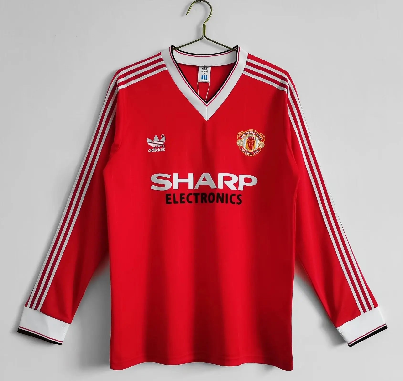 MAILLOT MANCHESTER UNITED DOMICILE 1982/1983 VERSION MANCHES LONGUES - Maillot du Monde