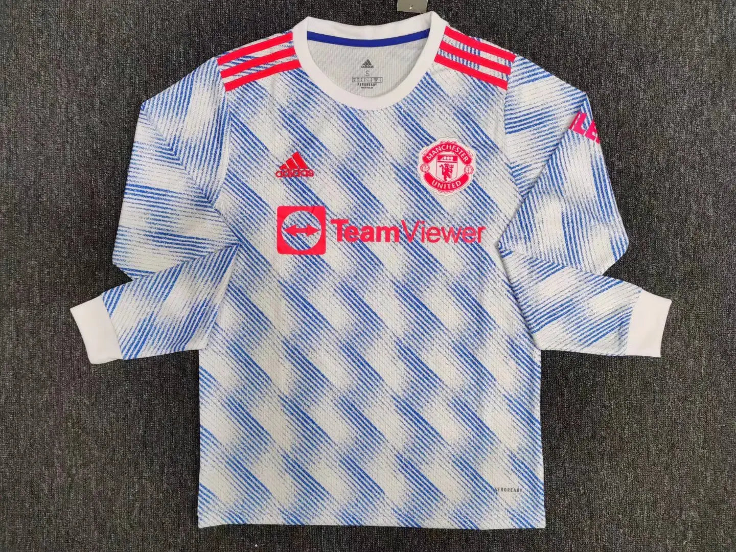 MAILLOT MANCHESTER UNITED EXTÉRIEUR 2021/2022 VERSION MANCHES LONGUES - Maillot du Monde