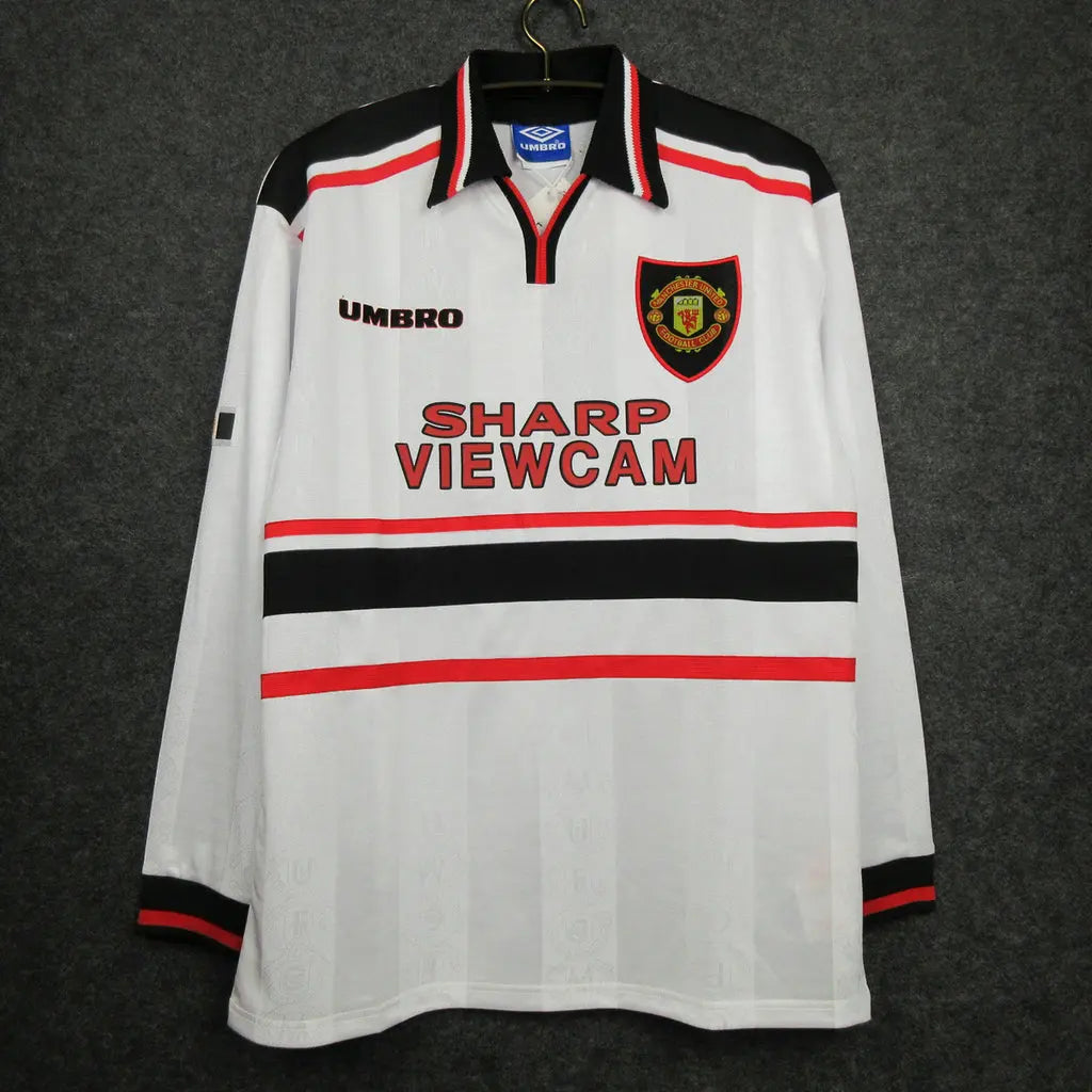 MAILLOT RETRO MANCHESTER UNITED 1998/1999 VERSION MANCHES LONGUES - Maillot du Monde