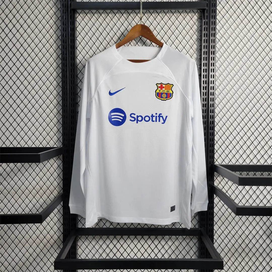 MAILLOT BARCELONE EXTÉRIEUR 2023/2024 VERSION MANCHES LONGUES - Maillot du Monde
