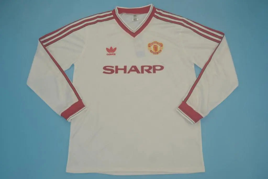 MAILLOT RETRO MANCHESTER UNITED DOMICILE 1986/1988 VERSION MANCHES LONGUES - Maillot du Monde