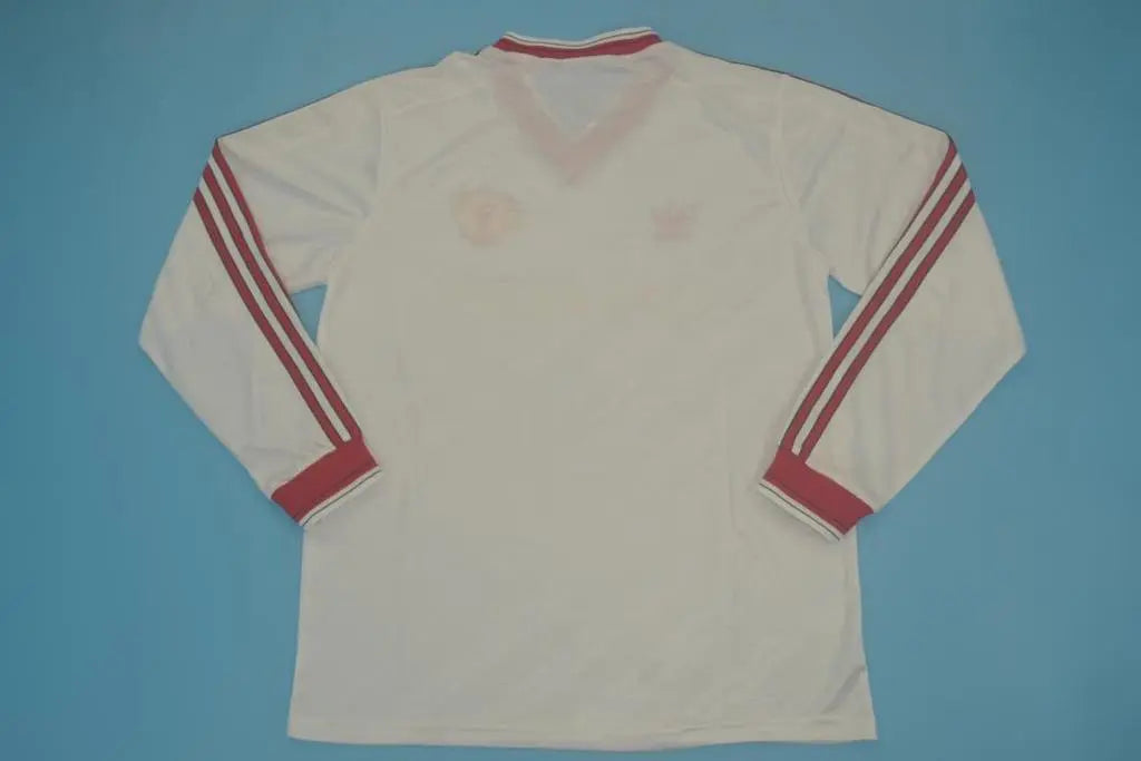 MAILLOT RETRO MANCHESTER UNITED DOMICILE 1986/1988 VERSION MANCHES LONGUES - Maillot du Monde