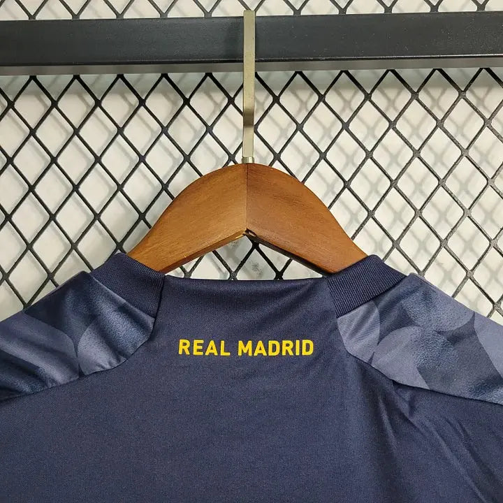 MAILLOT ENFANT REAL MADRID EXTÉRIEUR 2023/2024 - Maillot du Monde